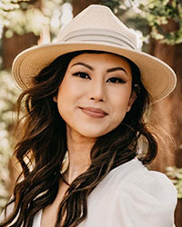 Dr. Anna Lam in wide-brimmed hat talks about cosmetics and permanent makeup