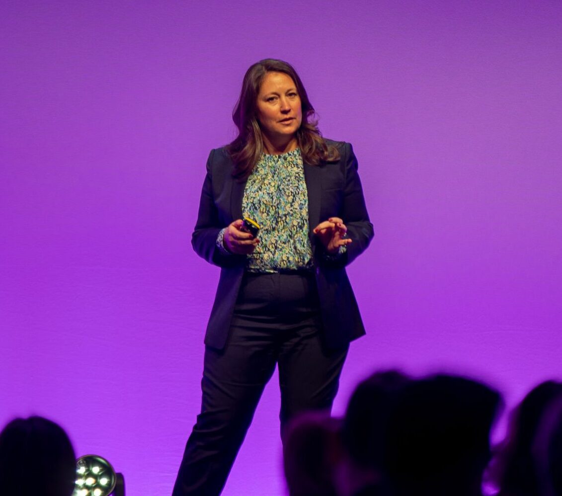 A photo of Jacqueline Henderson speaking at an event