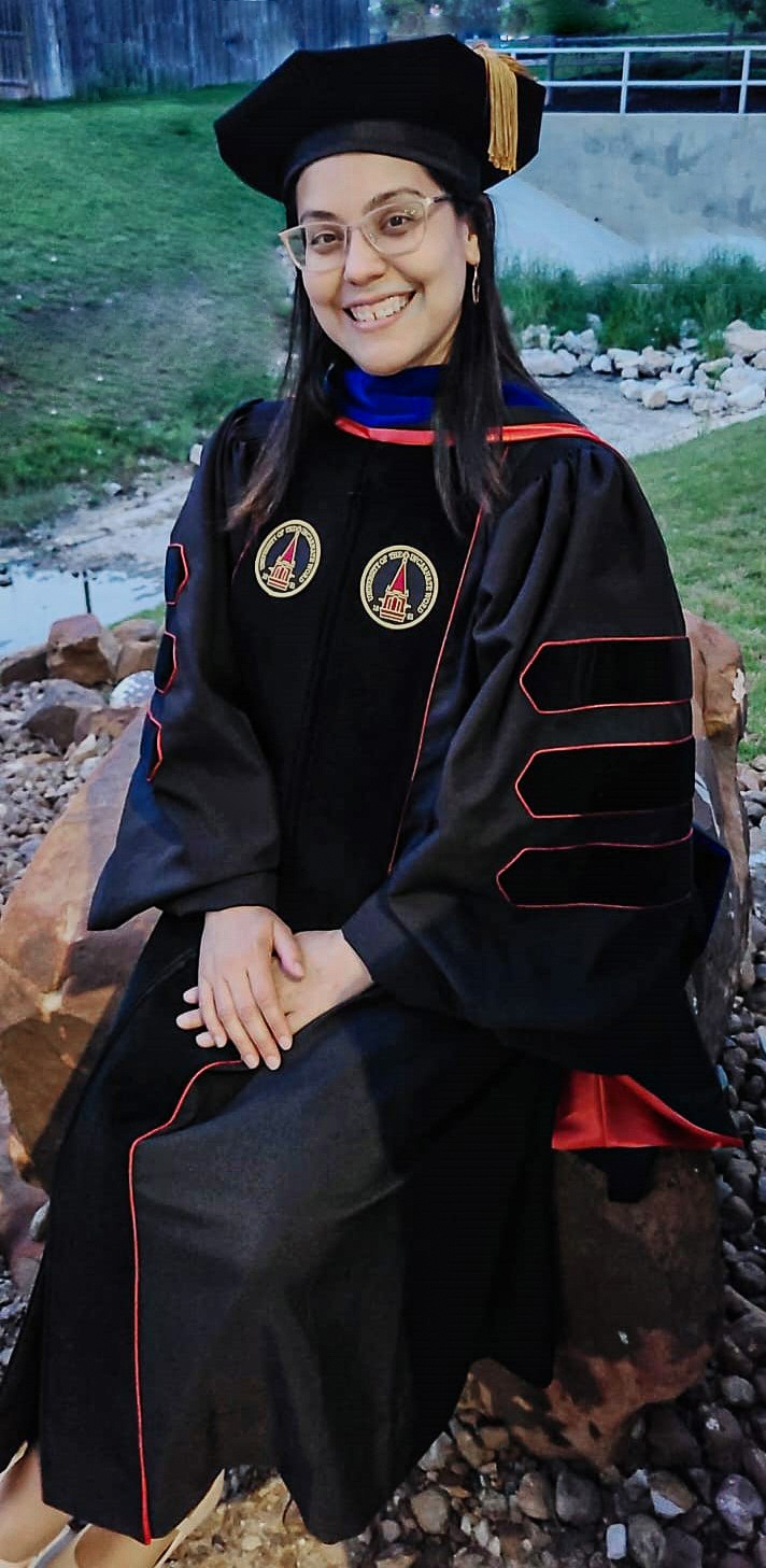 Graduation photo of Dr. Frances Silva who earns her PhD putting her research skills to use