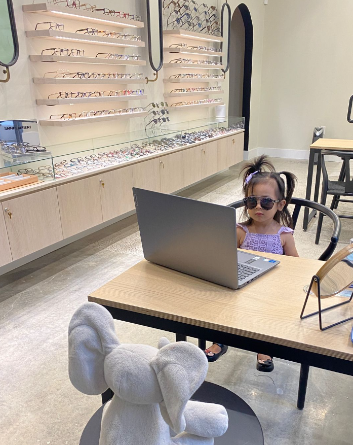 Dr. Lingad's "youngest employee"- aka her daughter- sitting in the optical