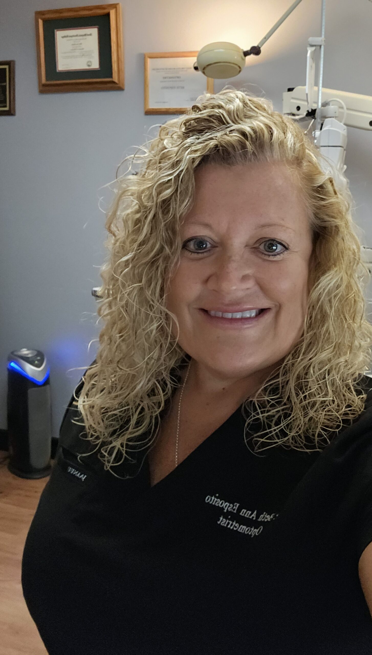 Beth Esosito in the exam room, happy to have her walmart career