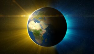 photo of earth with yellow on one side and electric blue on the other