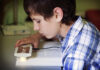 Poll Shows Strong Interest in Learning More About Low Vision Services boy using low vision device