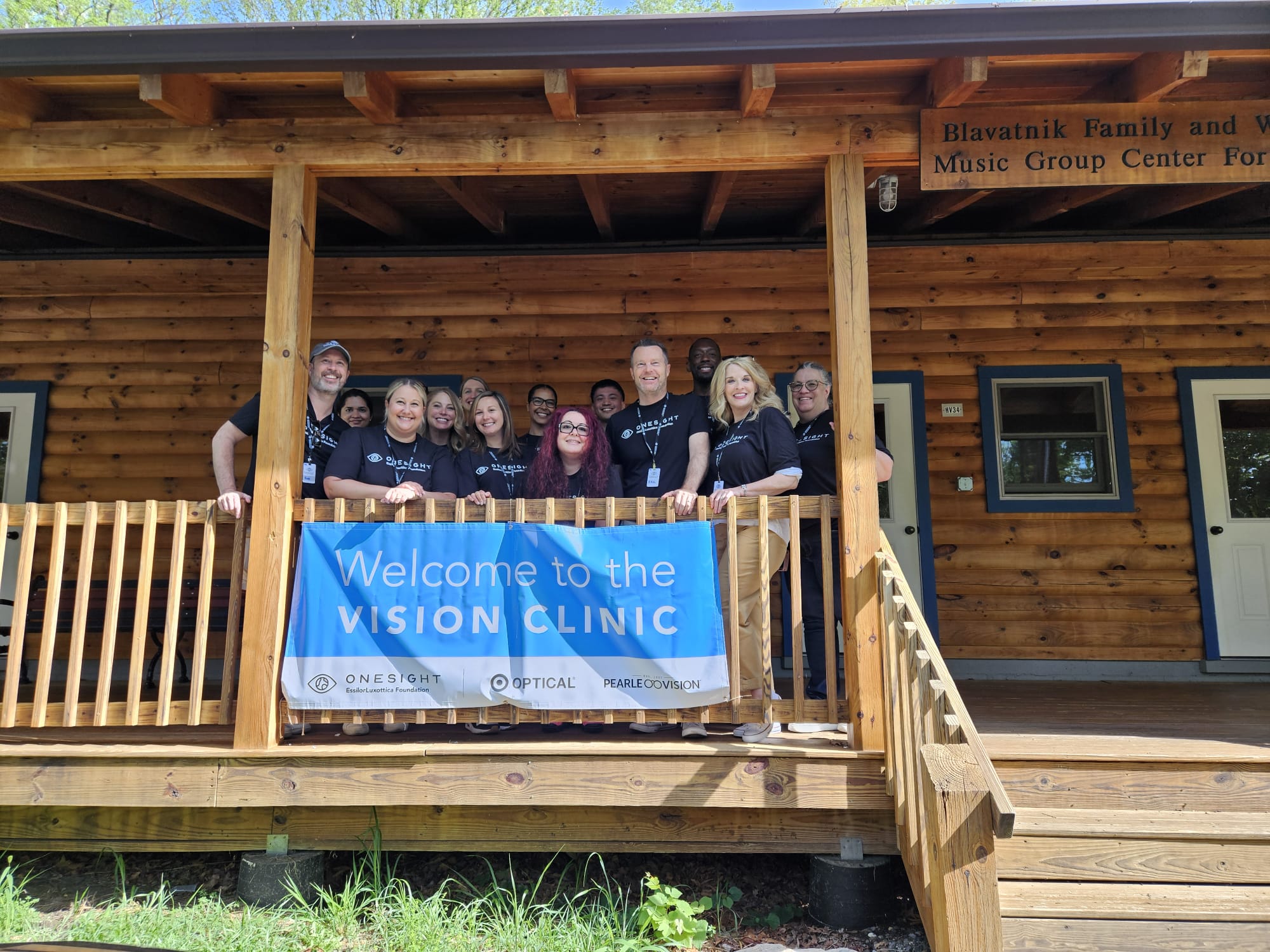 The OneSight team poses for a photo