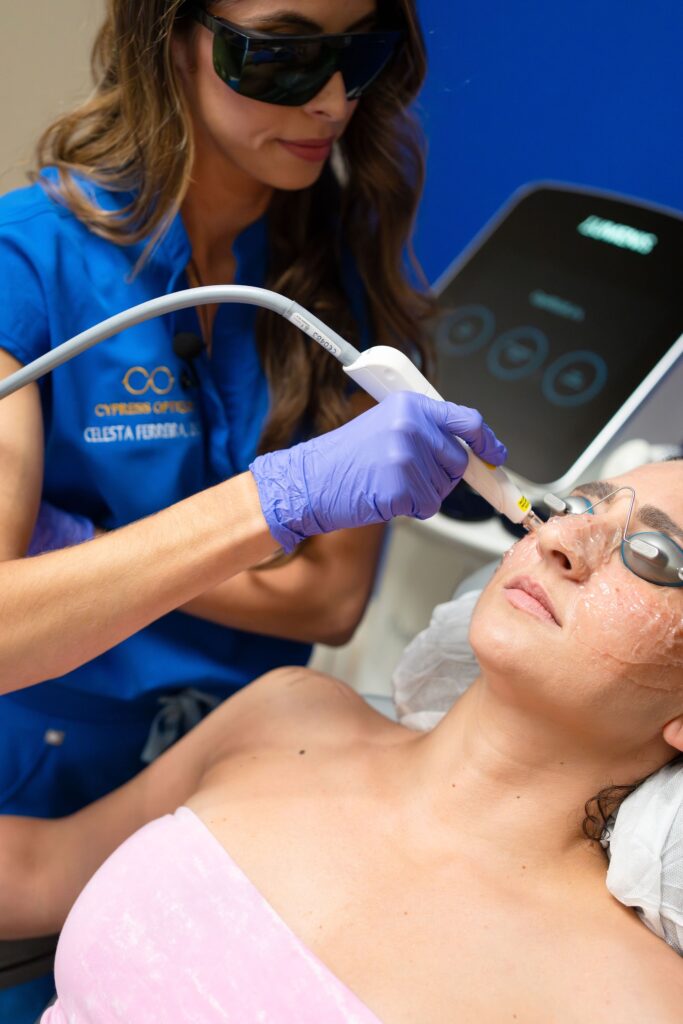Dr. Ferreria doing a Opitlight treatment for dry eye