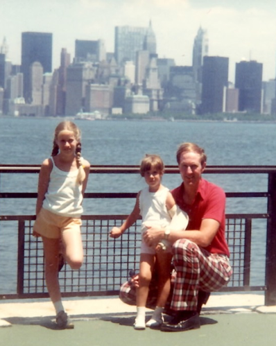 Dr. Richdale, center, with her late dad and older sister