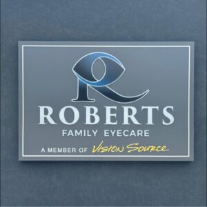 a close up of the roberts family eye care logo