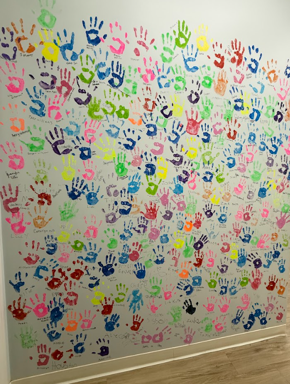 the practice's handprint wall