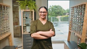 friendly employee in an optical representing patient-centric design