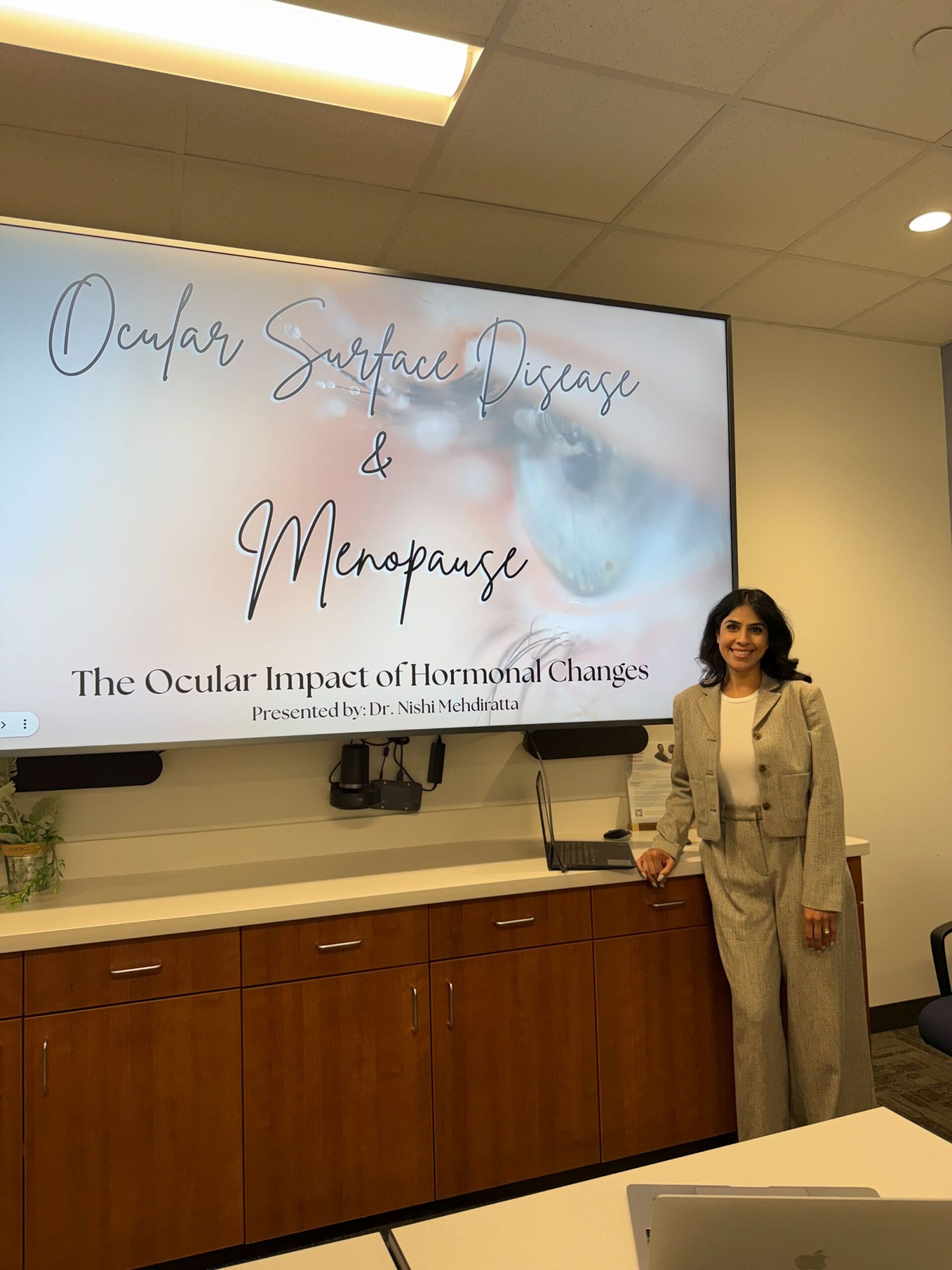 Dr. Mehdiratta presenting on menopausal dry eye at Texas Medical Center