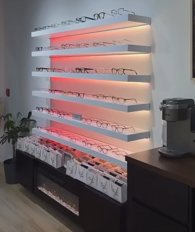the optical includes a cozy fireplace and beverage station