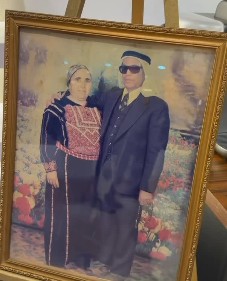 a framed photo of Dr. Salem's grandparents