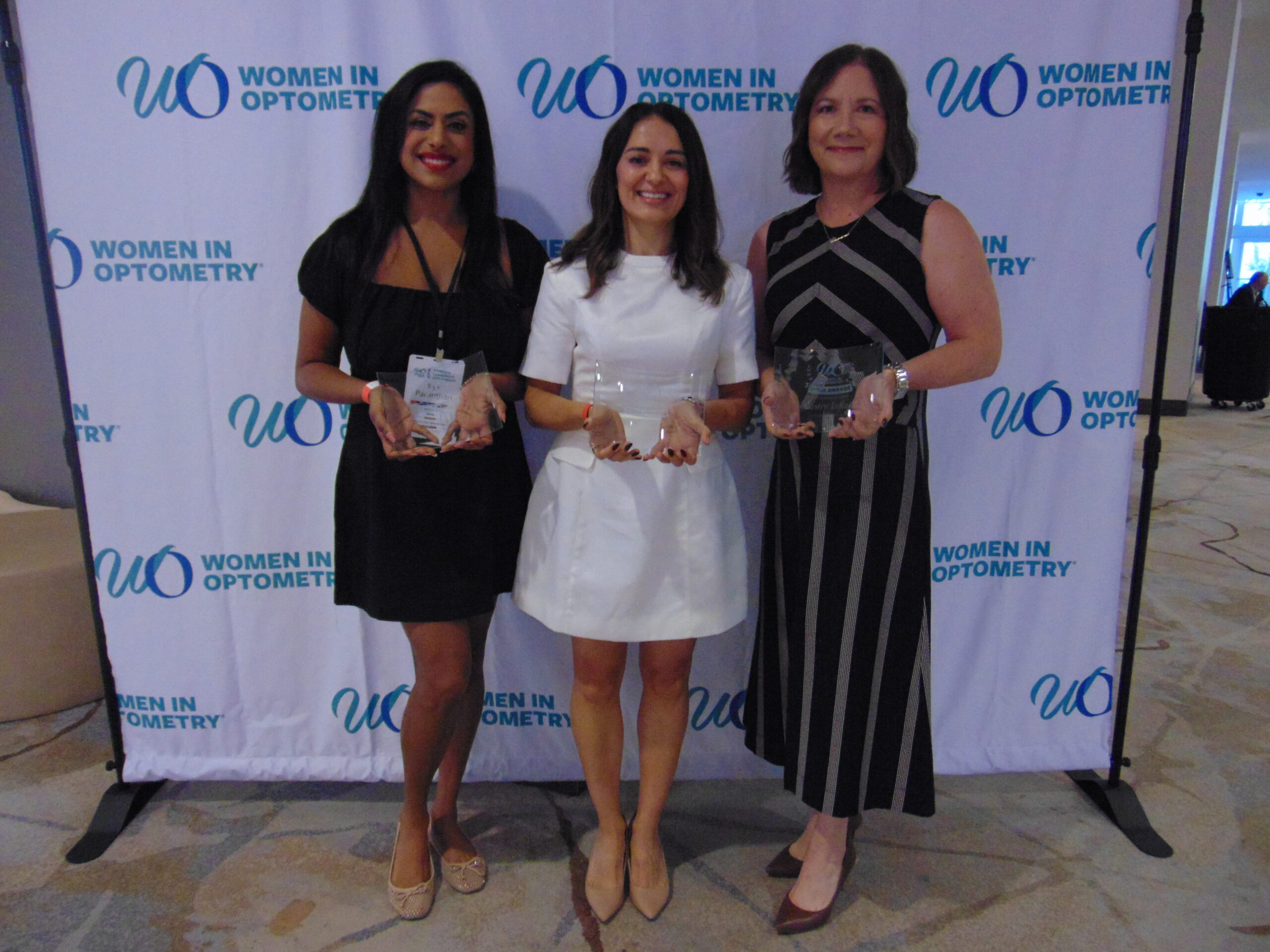 (l-r) Dr. Riya Paranthan, Dr. Mila Ioussifova and Dr. Kristin Anderson accept their Theia Awards.